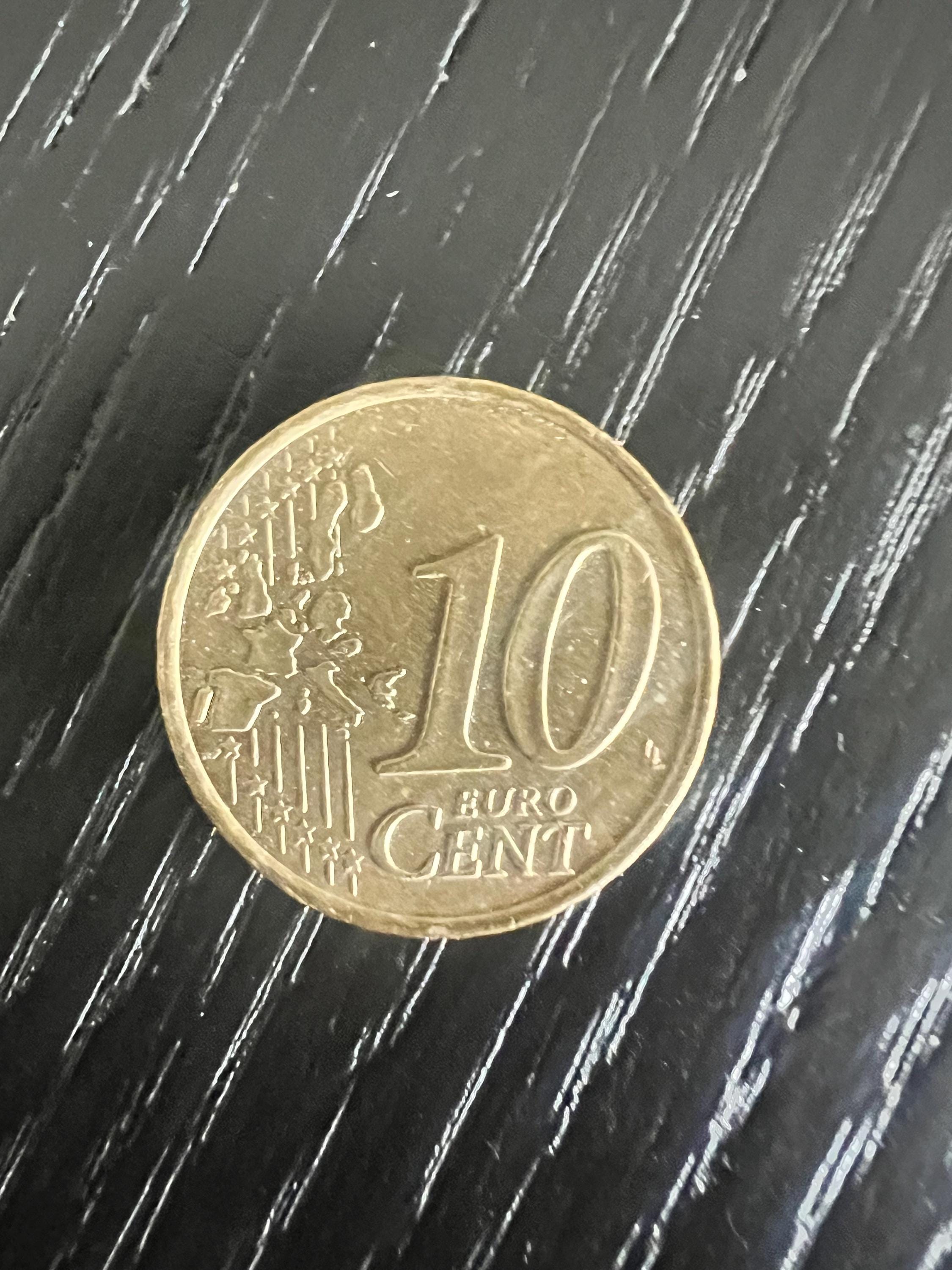 フランス10セント硬貨（西暦1999年もの）。 il_fullxfull.6270362287_ovqp.jpg