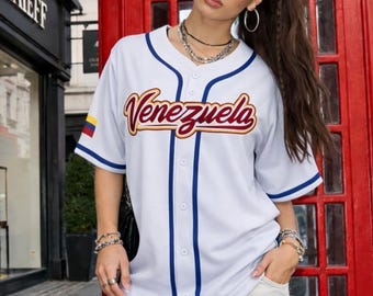 May include: A set of three ceramic nesting bowls in shades of blue, green, and white. The bowls feature a speckled glaze and a simple, modern design. The largest bowl measures approximately 8 inches in diameter.