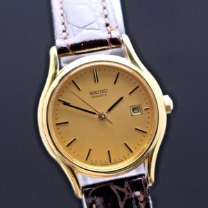 R7-3458 SEIKO 7N82-0791 クォーツ 腕時計 Seiko Watch Women 28mm White Dial Two Tone Date Round 7N82