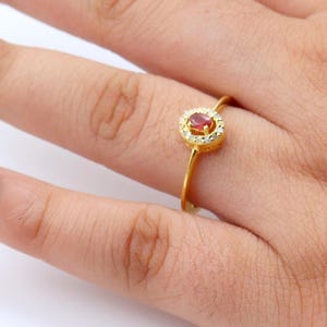 Gold Plated Ruby Diamond Ring: Oval Cut Halo Setting
