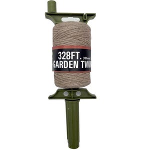 May include: A green garden twine dispenser with a spool of natural-colored twine. The label reads "328FT. (100 meter) GARDEN TWINE". The dispenser has a T-shaped base and a top piece to hold the twine.