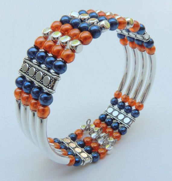 Items similar to Orange and Blue 4strand Cuff Bracelet on Etsy