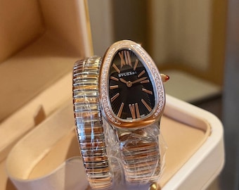 Reloj Serpentine Wrap – Correa de espiral de oro rosa y plata, bisel con apariencia de diamante