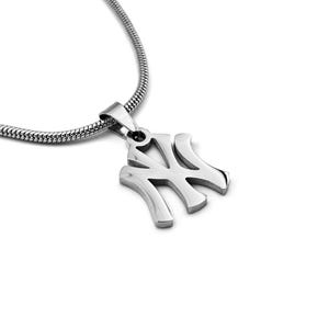 May include: A silver-colored pendant necklace featuring a stylized letter "NY" pendant. The pendant is made of a shiny metal and hangs from a silver chain. The necklace is displayed against a white background.
