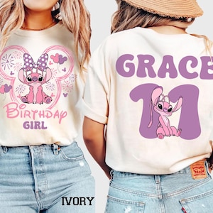 May include: Ivory-colored t-shirts with a cartoon character design. One shirt features a pink character with the text "Birthday Girl". The other shirt has the name "Grace" and the number "11" with the same character.