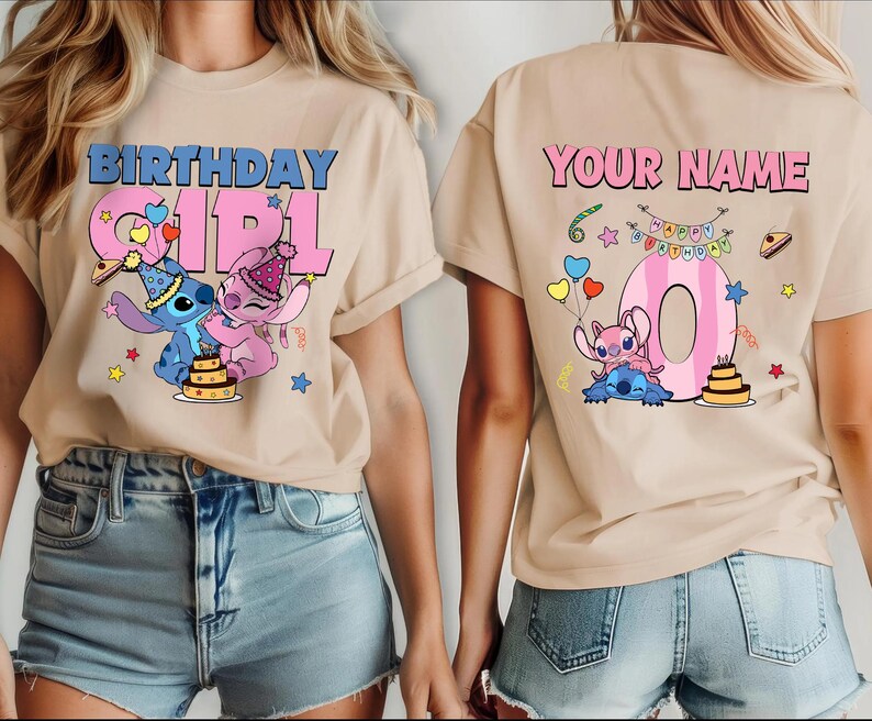 May include: Beige t-shirt with a colorful graphic featuring the words "BIRTHDAY GIRL" and a cartoon character. The back of the shirt has the words "YOUR NAME" and a number 0 with cartoon characters and birthday decorations. The shirt is paired with denim shorts.
