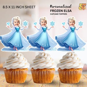 Könnte beinhalten: Personalisierte Frozen Elsa Cupcake-Topper. Das Bild zeigt drei Elsa-Ausschnitte in einem blauen Kleid, die ein Herz und einen Schneeflocke halten. Die Topper sind über drei Cupcakes mit weißem Zuckerguss platziert. Die Blattgröße beträgt 21,6 x 27,9 cm.