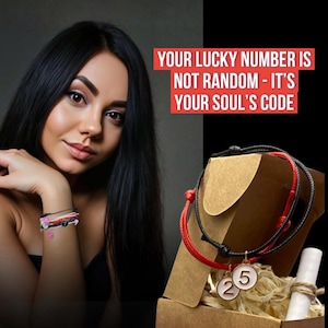 May include: A woman with long black hair is shown with several bracelets on her wrist. The image also features a red and black bracelet set with number charms in a gift box. Text in the image reads: "YOUR LUCKY NUMBER IS NOT RANDOM - IT'S YOUR SOUL'S CODE."