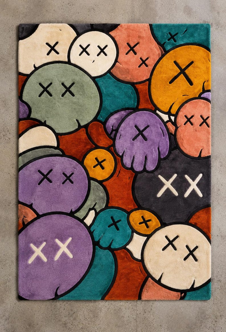 Handmade tufted rug featuring colorful abstract cartoon faces with X eyes, modern street art inspired design, soft textured area rug for bedroom, living room, gaming room, and contemporary home decor.