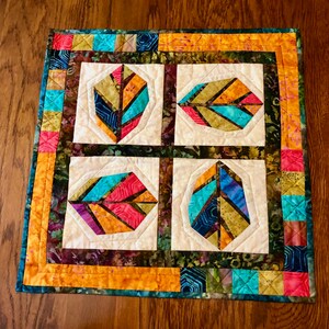 Geometric Leaves table topper in bright brightly colored batik fabrics