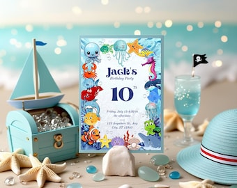 May include: A birthday party invitation with an ocean theme. The invitation features colorful sea creatures and the text "Jack's Birthday Party 10th". A blue toy sailboat, treasure chest, and starfish are also present.
