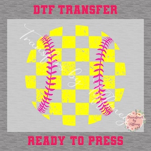 May include: A softball design with a yellow and gray checkered pattern, featuring pink stitching. The words "DTF TRANSFER" and "READY TO PRESS" are displayed in pink. The design is for transfers.