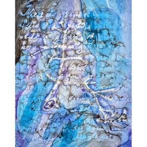 May include: Abstract artwork in shades of blue, purple, and grey. The piece incorporates handwritten script over the colourful background, producing a textured, layered effect. The overall theme is artistic and expressive, with a focus on texture.