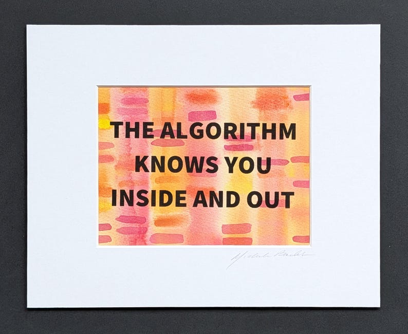May include: A framed art print with the text "THE ALGORITHM KNOWS YOU INSIDE AND OUT" in black. The background features a watercolor design with orange, yellow, and pink hues. The print is matted in white and set against a black background.