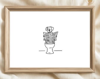 Peut inclure: Impression encadrée présentant une illustration en noir et blanc d'un chien lisant un journal sur des toilettes. L'œuvre est encadrée dans un cadre en bois brun clair, sur fond blanc.