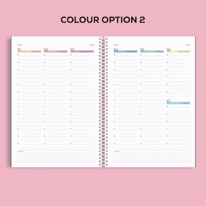 May include: Open spiral-bound planner with a pink cover. The interior pages are white with a weekly layout, featuring dates and space for notes. The text "COLOUR OPTION 2" is at the top. The dates of May 11-17, 2026 are visible.