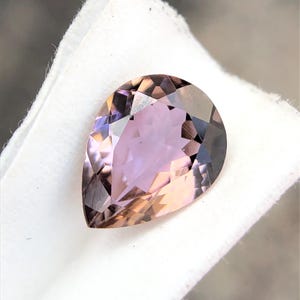 Natural Purple Brown Tanzanite 1.35 Carat Gemstone, Unheated Zoisite Pear Shape Cut Gemstone