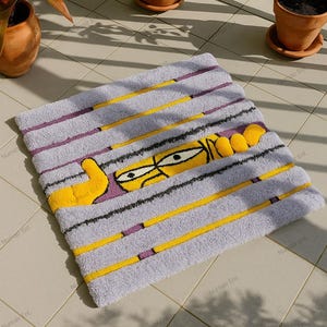 Funny Cartoon Eyes Tufted Rug – Handcrafted Grey Striped Rug with Yellow Character Design, Playful Modern Decor for Living Room or Entryway