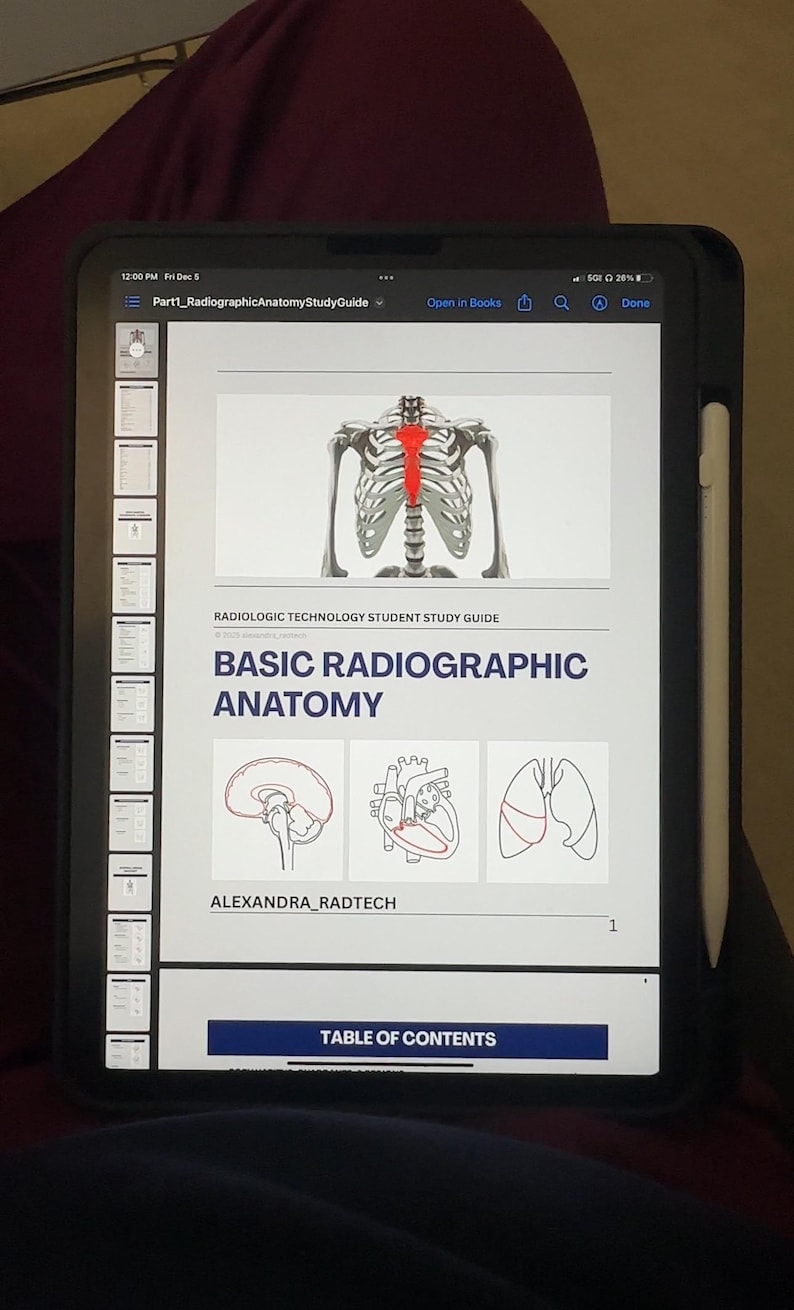 May include: A digital tablet showing a study guide on Basic Radiographic Anatomy. The screen displays a skeletal illustration with a highlighted spine, and diagrams of the brain, heart, and lungs. The text "RADIOLOGIC TECHNOLOGY STUDENT STUDY GUIDE" is visible.