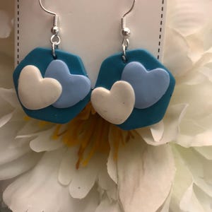 Boucles d&#39;oreilles double coeur
