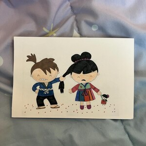May include: A hand-drawn illustration depicts two cartoon figures. One figure, in a blue outfit, pulls the other's hair. The second figure, in a colorful dress, looks upset and holds a small doll. Red dots are scattered on the ground.
