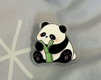 Kawaii panda with a bamboo pin