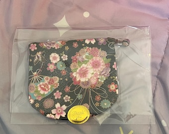 Japanese black floral patterned silk pouch mint in a bag