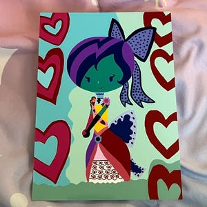 May include: A colorful illustration of a whimsical figure with a green face, purple hair, and a large bow. The figure wears a patterned dress and holds a staff. The background features hearts and a teal and green color scheme.