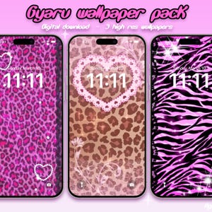 May include: Three phone screens displaying digital wallpapers. The wallpapers feature pink leopard print, a brown leopard print with a heart design, and a pink zebra stripe pattern. The text "Gyaru wallpaper pack" and "Digital download - 3 high res wallpapers" are visible.