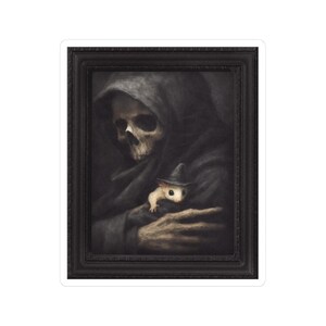 May include: A sticker featuring a dark, gothic illustration. It depicts a skeletal figure in a hooded cloak cradling a small, white creature wearing a witch's hat. The artwork is framed in black, with a vintage aesthetic.