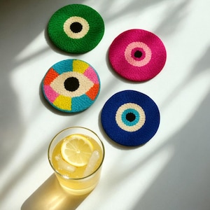 Evil Eye Coaster Set – 4-Piece Colorful Table Decor – Nazar Design Fabric Drink Coasters – Protective & Stylish Table Accessories