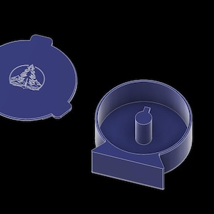 以下が含まれることがあります： 青色の3Dレンダリングされた容器と蓋。蓋は3つのタブと木のグラフィックが付いた円形です。容器は、小さな中央の柱と長方形のベースを備えた円筒形をしています。