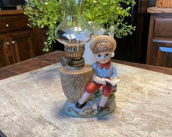 Vintage Oil Lamp Bisque Ceramic Oil Lamp with Globe Boy Sitting on a Rock Reading