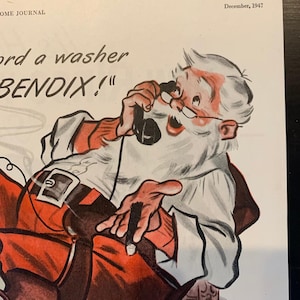 May include: Vintage illustration from the Home Journal, December 1947, depicting Santa Claus on the phone. He is in a red suit and white beard, holding a cigar. The text reads "ord a washer BENDIX!"