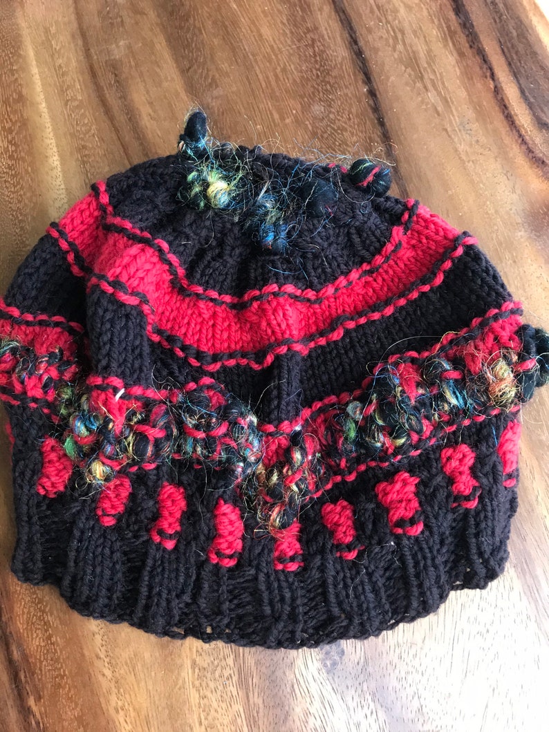 Red and black wool hat