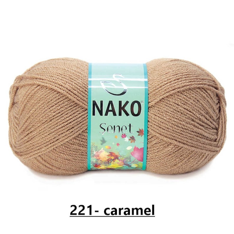 Puede incluir: Un ovillo de hilo marr&oacute;n con una etiqueta que dice "NAKO Senet 221 - caramel".