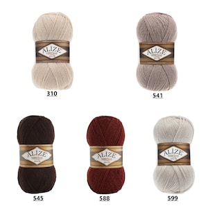 May include: Five balls of yarn in different colors: beige, gray, brown, red, and white. Each ball has a label that says "Alize Superlana Zin&ccedil;ir".