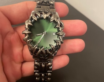 Alabaster Industries with Green Emerald Face