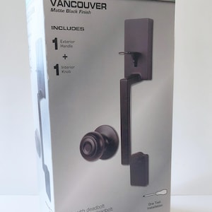 May include: A matte black Defiant Vancouver entry door handle set. The box includes an exterior handle and an interior knob. The packaging also states "One Tool Installation" and "Lifetime".