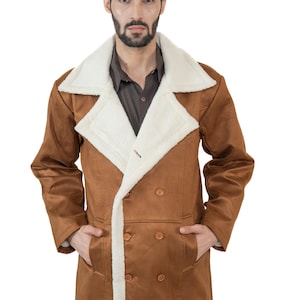 May include: A brown double-breasted coat with a white faux fur collar and trim. The coat features two rows of buttons and pockets. The person is wearing a brown button-down shirt.