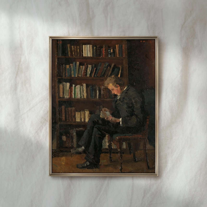 May include: An antique framed painting depicts a person seated, reading a book in front of a bookshelf filled with books. The person is wearing a dark suit. The painting has a warm, muted color palette.