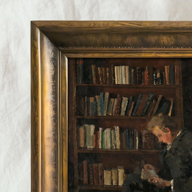 May include: An antique oil painting in a gold-toned wooden frame. The artwork depicts a person reading in a library, with a bookshelf filled with books in the background. The painting has a warm, vintage aesthetic.