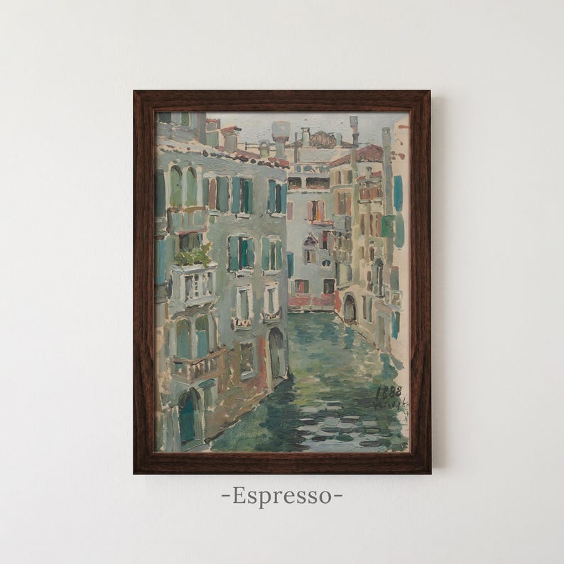 May include: A framed oil painting depicting a canal scene in Venice with multi-story buildings featuring teal shutters and balconies. The water reflects the architecture in muted tones of blue, green, and grey. The painting is dated 1888 in the corner.
