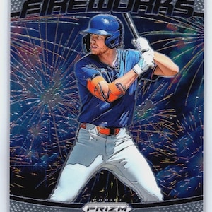 May include: Baseball trading card featuring Carson Benge in a New York "Fireworks" design. The card has a blue and silver color scheme with a baseball player in a batting stance. The background shows a fireworks display.