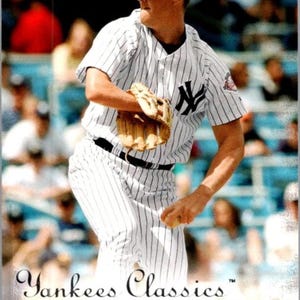 May include: A baseball card featuring Jim Abbott in a New York Yankees uniform. The card shows Abbott in a pinstriped jersey and pants, wearing a navy cap. The card reads "Yankees Classics" and "Jim Abbott".