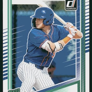 May include: Baseball card featuring Carson Benge of NY in a blue and orange uniform, holding a bat. The card has a green and white border with the Donruss logo and "Rated Prospect" text.