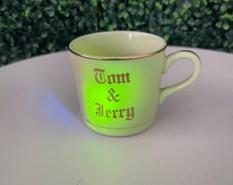 Uranium glaze- vintage Hall Pottery Tom & Jerry mug. 1930s-40s.
