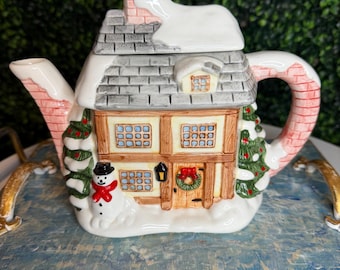 The village teapot winter cottage by Annie Rowe