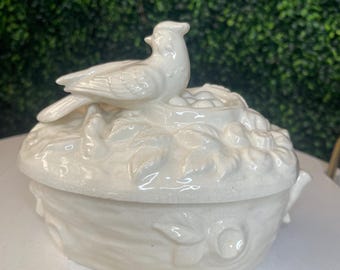 white ceramic bird on nest trinket box