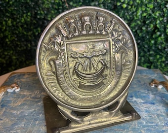 Vintage brass crest Portugal folding book end